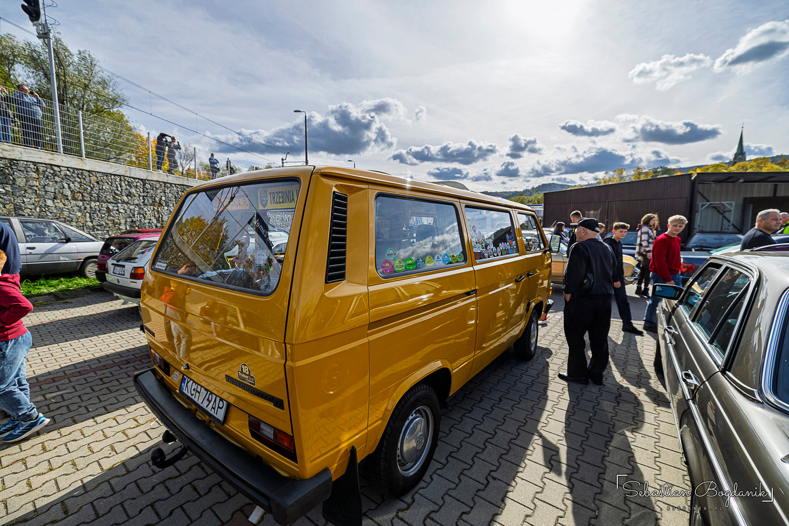 A VW Vanagon, the T3, with a mannequin under the front bumper, mid-repair (1/2)